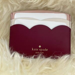 Kate spade gemma small slim card holder in burgundy/pink